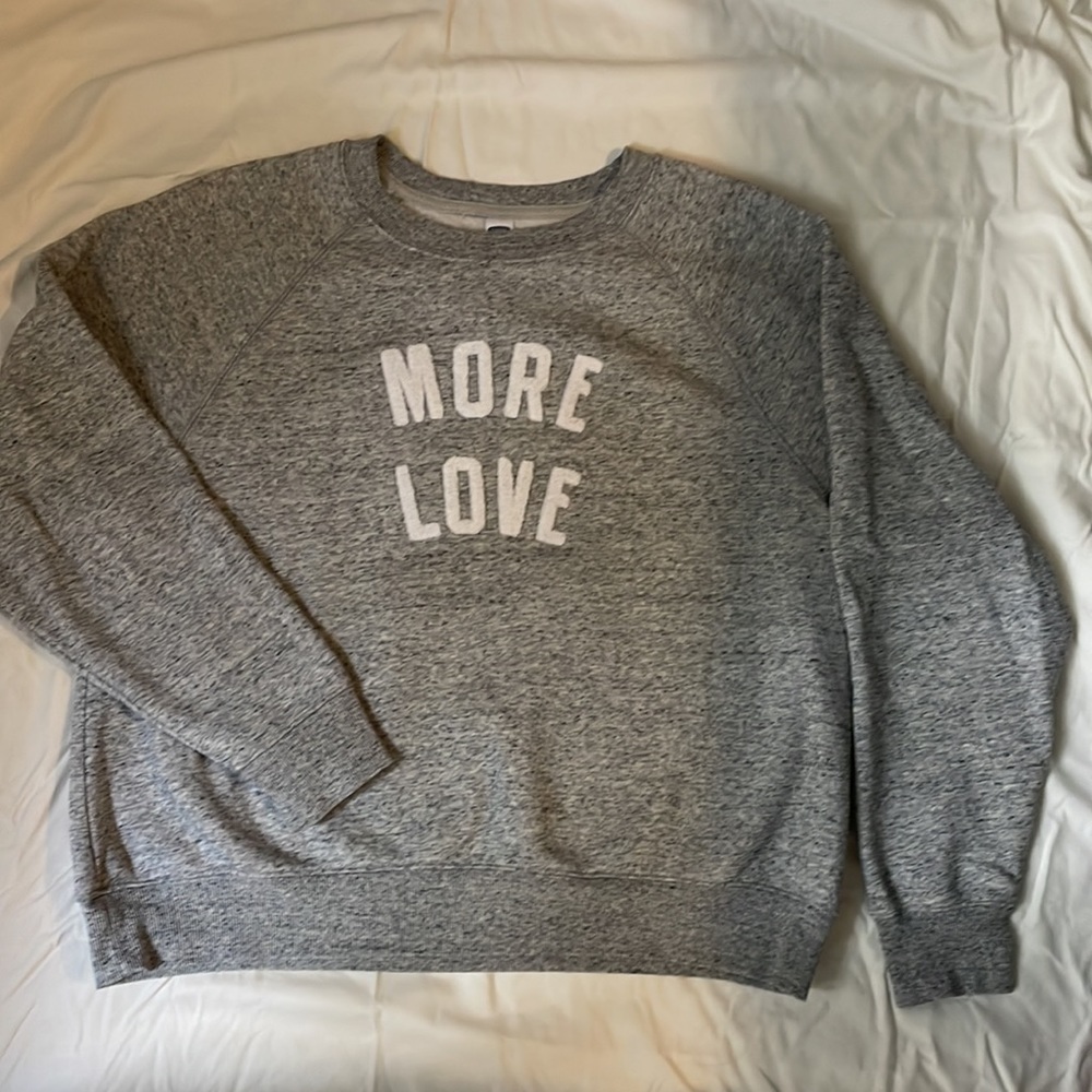 Old Navy women’s sweatshirt in heather gray with white lettering. Size large.